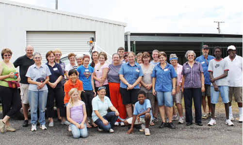 ABOVE: Members from Capella and Clermont Uniting and Assembly of God churches and Coles staff help out yesterday. tm-180111-005 ABOVE: Members from Capella and Clermont Uniting and Assembly of God churches and Coles staff help out yesterday. tm-180111-005